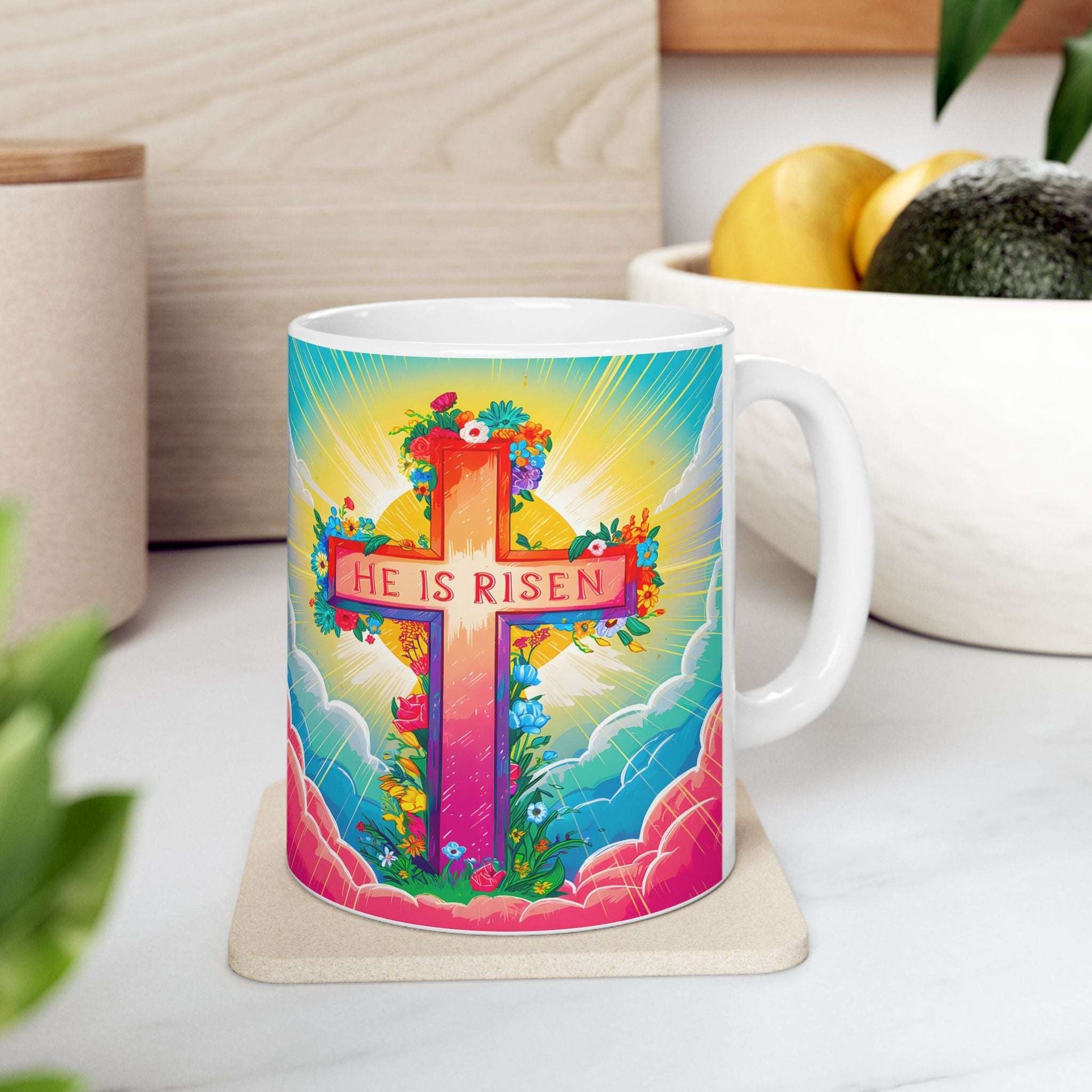 He Is Risen Christian mug left side view on a coaster