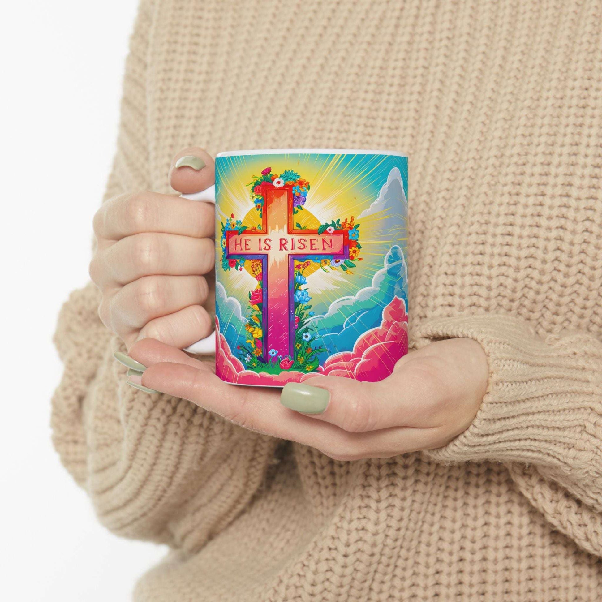 He Is Risen Christian mug right side view someone holding the mug